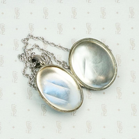 Buckle Engraved Silver Victorian Locket, interior view.