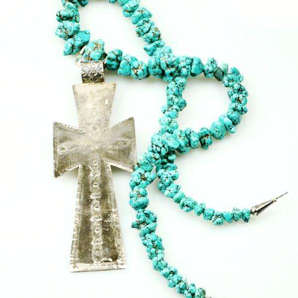 Long strand of Natural Turquoise Nuggets with a Large Silver Cross
