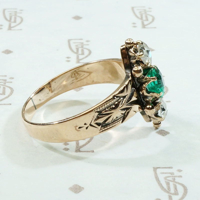 Vibrant Green Emerald with Juicy Rose Cut Diamonds