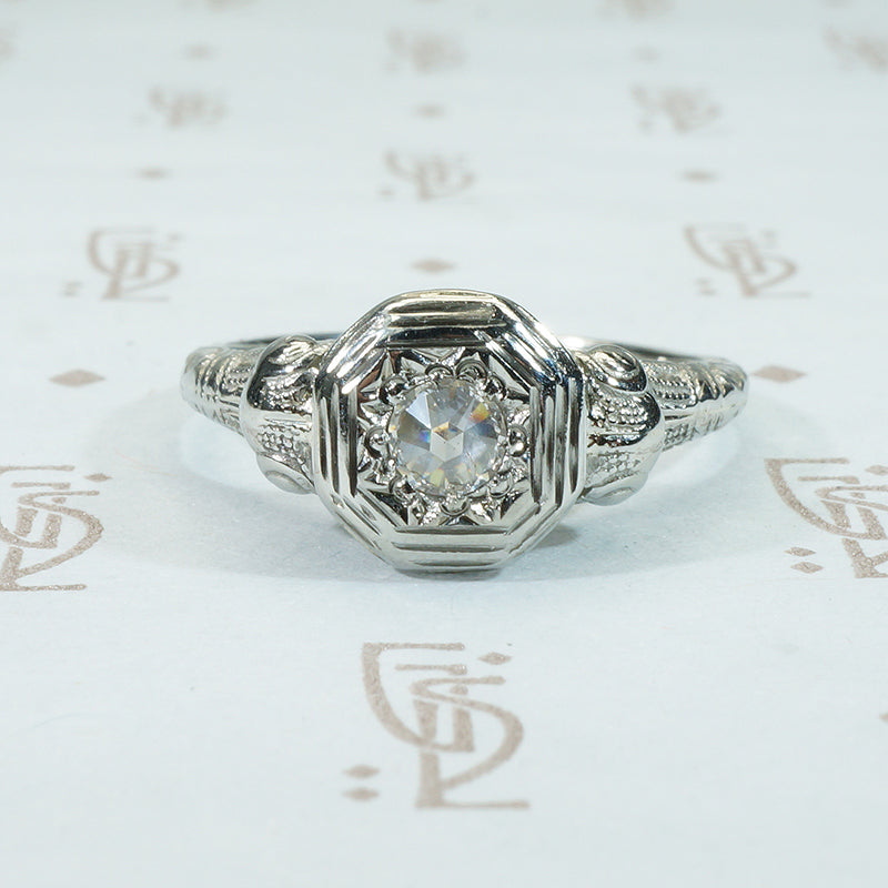 rose cut diamond in 18k white gold filigree ring