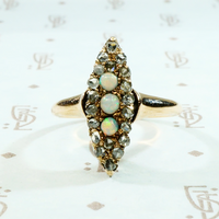 opal and rose cut diamond navette ring in rose gold