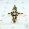 opal and rose cut diamond navette ring in rose gold