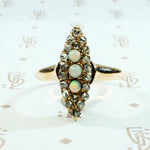 opal and rose cut diamond navette ring in rose gold