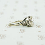 .44ct rose cut diamond in white gold filigree ring side view