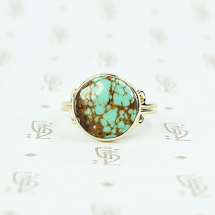 round turquoise in 14k gold specimen ring