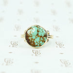 round turquoise in 14k gold specimen ring