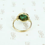 round turquoise in 14k gold specimen ring back view