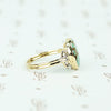 round turquoise in 14k gold specimen ring side view