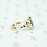round turquoise in 14k gold specimen ring side view