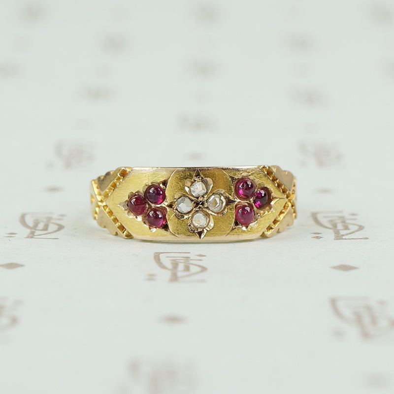 hallmarked 15ct gold band with diamonds and rubies