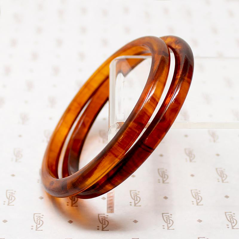 set of two vintage plastic bangle bracelets