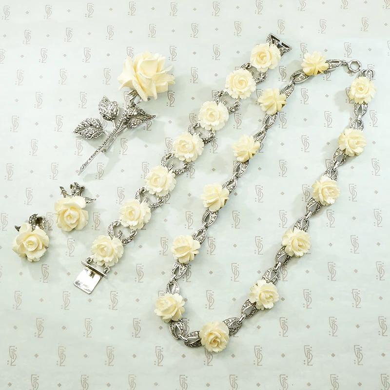 Four Piece Suite of Carved Rose, Silver & Marcasite Jewelry