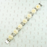 Four Piece Suite of Carved Rose, Silver & Marcasite Jewelry
