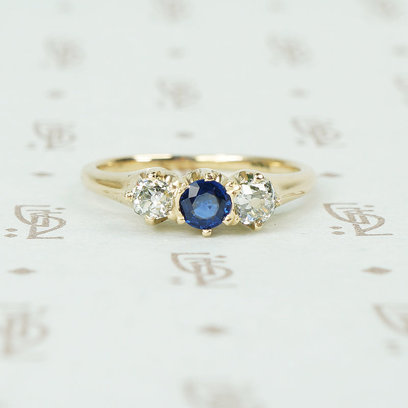 mine cut diamonds and sapphire ring in yellow gold circa 1890