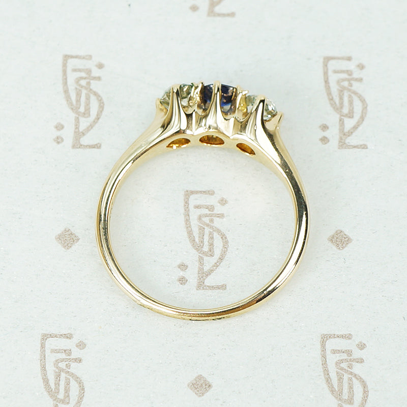 mine cut diamonds and sapphire ring in yellow gold circa 1890 side view