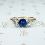 gorgeous cushion cut cornflower blue sapphire and 2 oec diamonds in platinum on 14k 3 stone ring