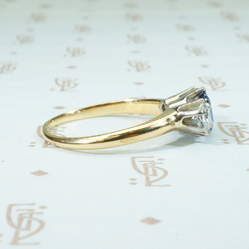 gorgeous cushion cut cornflower blue sapphire and 2 oec diamonds in platinum on 14k 3 stone ring