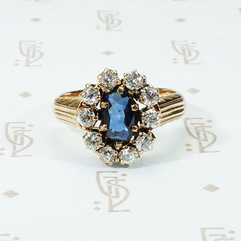 oval sapphire in oec diamond halo 14k old rose gold