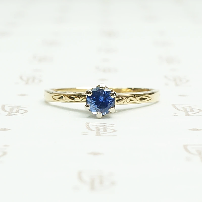 Enchanting Engraved Gold Montana Sapphire Engagement Ring