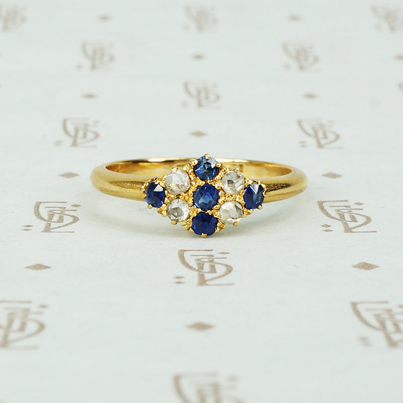 blue sapphire and rose cut diamond ring in 18k yellow gold circa 1900.