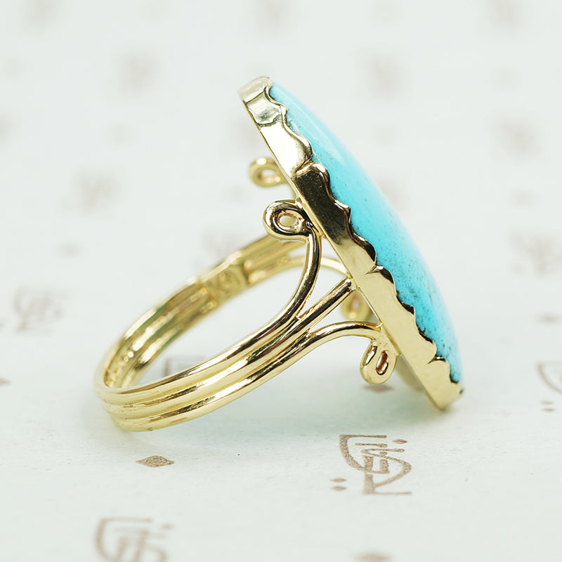 lovely spcimen blue turquise ring in gold side triple band