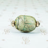 faience scarab in gold swivel ring