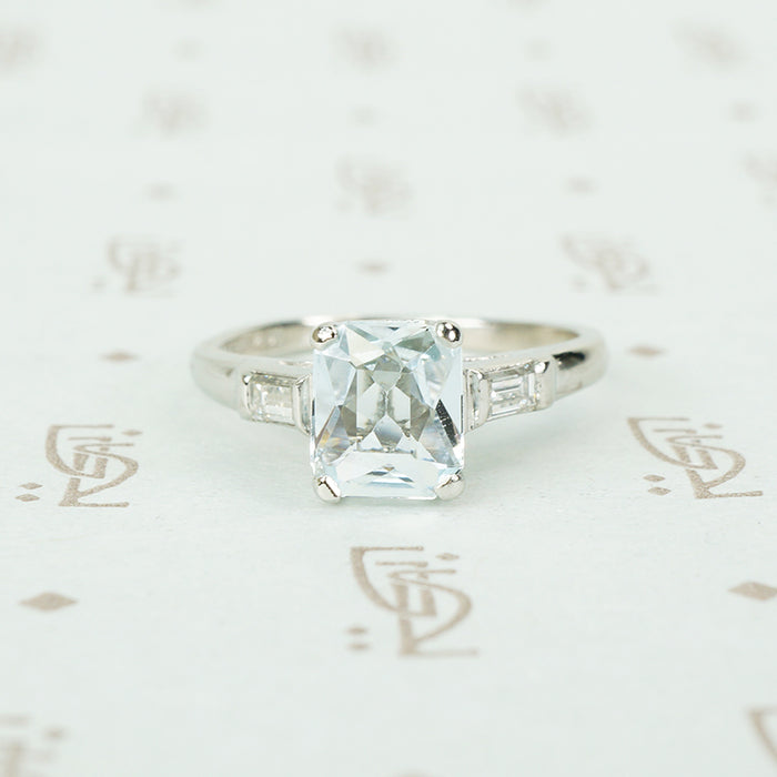 scissor cut aquamarine platinum engagement ring with baguettes