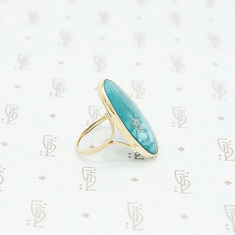 gold and turquoise ring side view