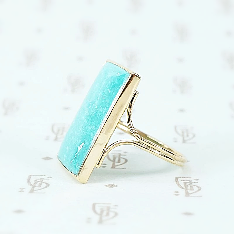 the finest turquoise and 14k recycled gold ring side view