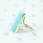 the finest turquoise and 14k recycled gold ring side view