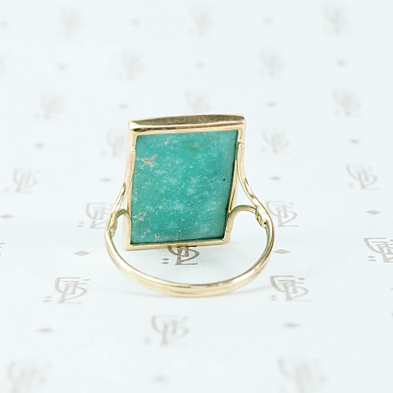 the finest turquoise and 14k recycled gold ring back