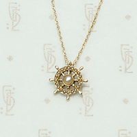 Ship's Wheel Conversion Pendant in Gold and Pearls, detail view.