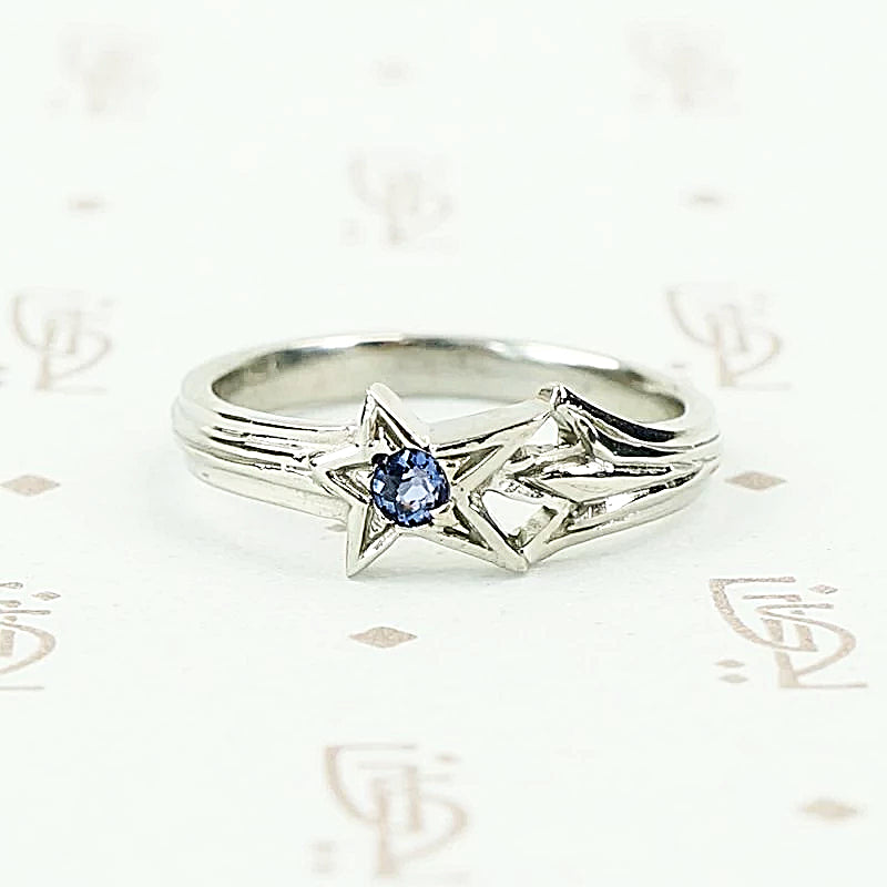 Shooting star ring by 720 in white gold and Montana sapphire.