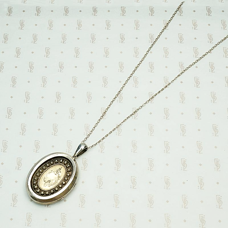 Fashionable Victorian Engraved Silver Locket, back view.