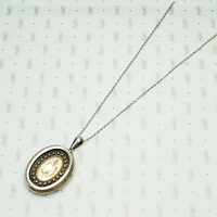 Fashionable Victorian Engraved Silver Locket, back view.