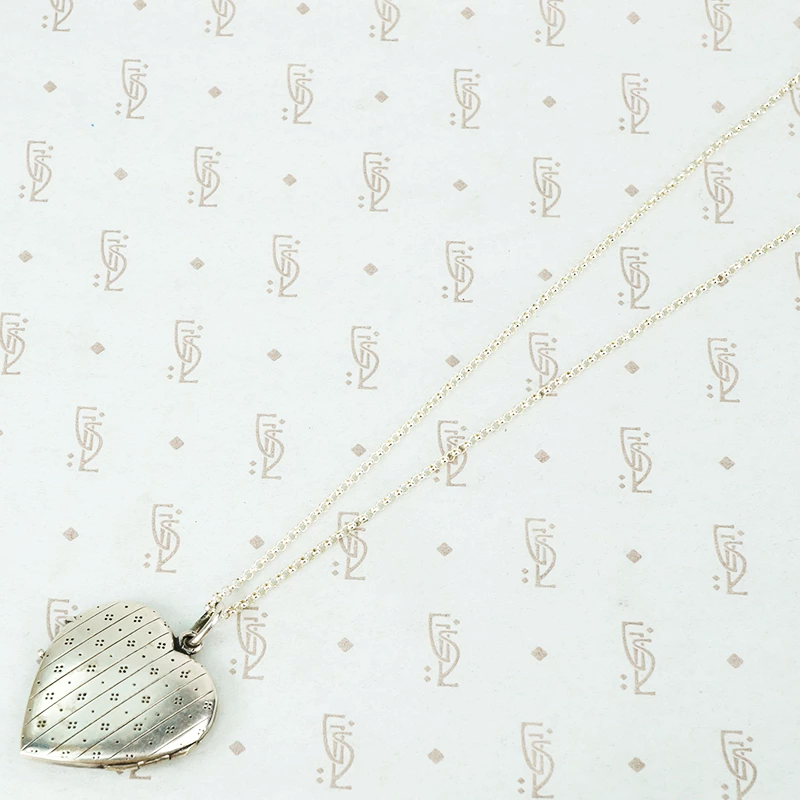 Unusual Silver Heart Shaped Locket Gem Set
