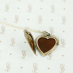 Unusual Silver Heart Shaped Locket Gem Set
