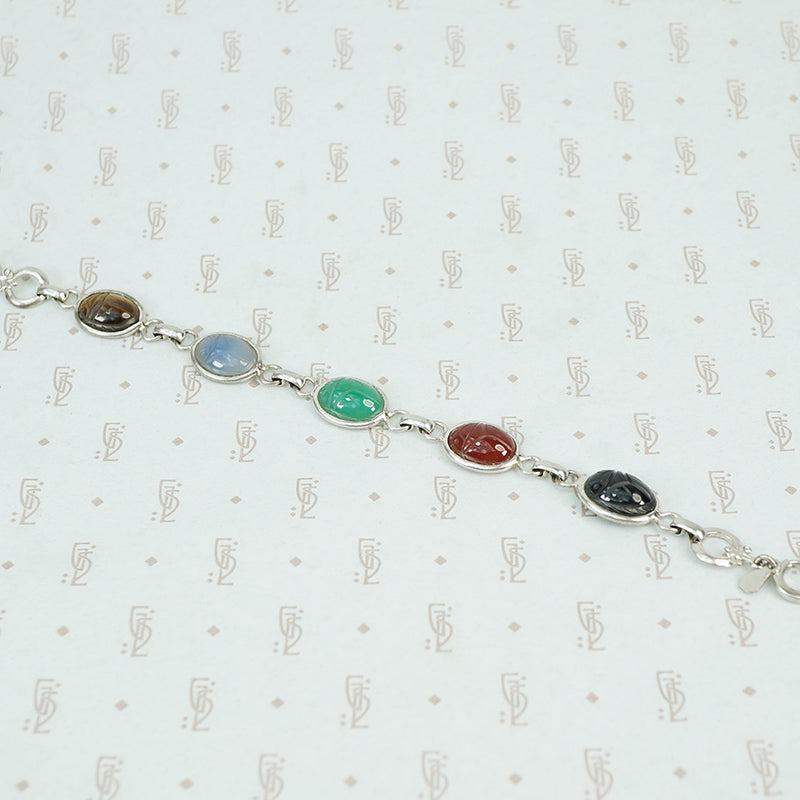 1950's sterling silver bracelet with semi precious stone scarabs
