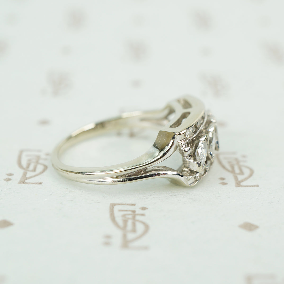 slanted marquis diamonds in white gold wide band 1950's side view