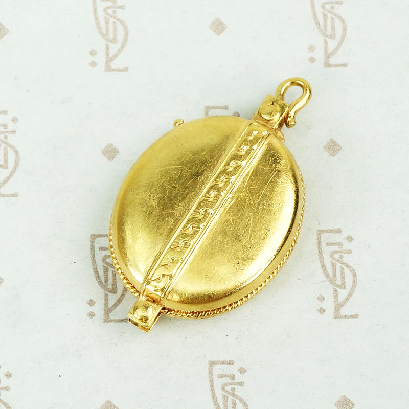 18ct yellow gold sliding antique locket