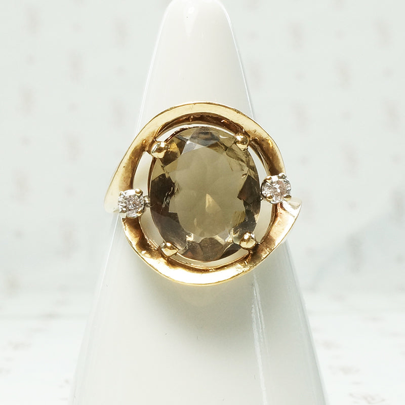 lovely bold oval smokey quartz and diamond ring in yellow gold circa 1960