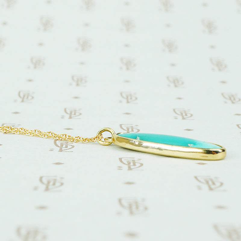 vintage turquoise in recycled gold pendant side view