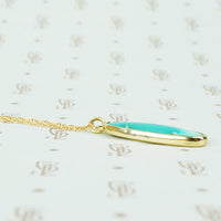 vintage turquoise in recycled gold pendant side view