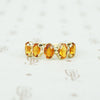spesserite garnet 5 stone 18k recycled gold band