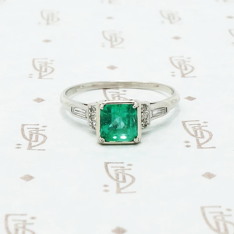 platinum emerald engagement ring