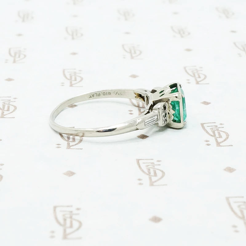 platinum emerald engagement ring
