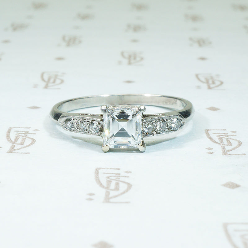 platinum engagement ring with gia certed square step cut VS1-E 