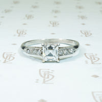 platinum engagement ring with gia certed square step cut VS1-E 
