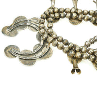 A Vintage Navajo Squash Blossom Necklace with Turquoise