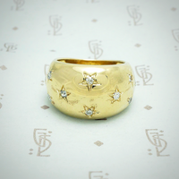 14k yellow gold shiny dome ring with star set diamonds